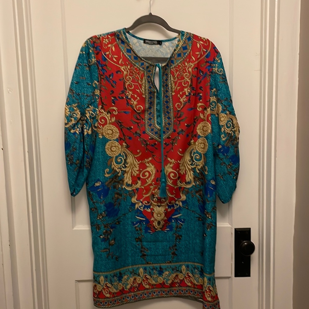 Urban Coco polyester shift dress with tie neckline and gathered sleeves.